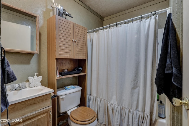 bathroom with vanity, a shower with shower curtain, a textured ceiling, and toilet