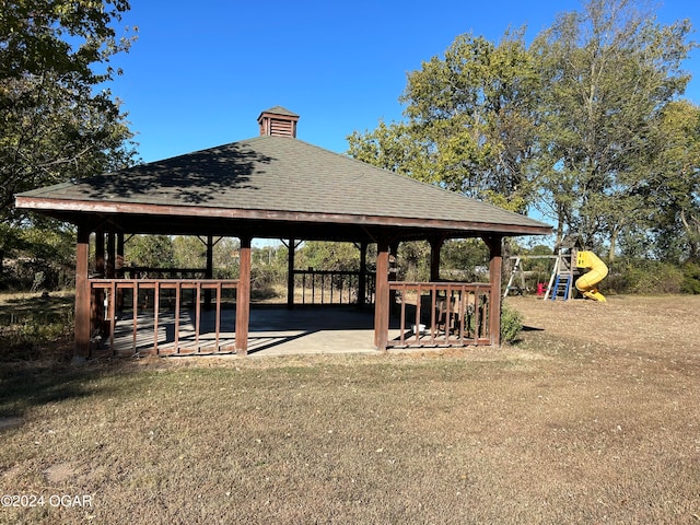 view of property's community with a gazebo, a yard, and a playground