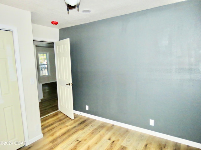 unfurnished bedroom featuring light hardwood / wood-style flooring