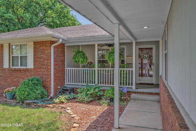 property entrance featuring covered porch