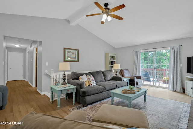 living room featuring beamed ceiling, high vaulted ceiling, light hardwood / wood-style floors, and ceiling fan