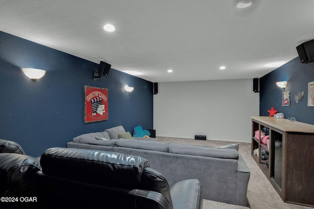 home theater with light colored carpet