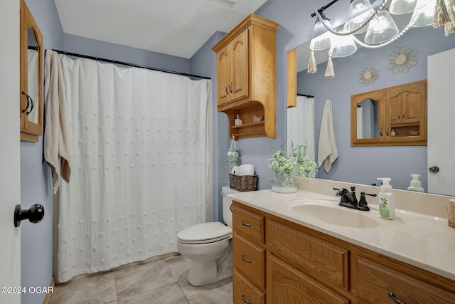 bathroom with an inviting chandelier, toilet, vanity, curtained shower, and tile patterned flooring