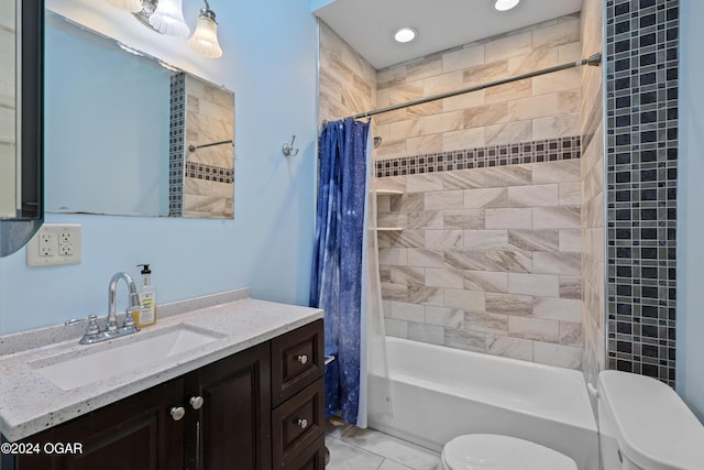 full bathroom with vanity, toilet, tile patterned floors, and shower / tub combo with curtain