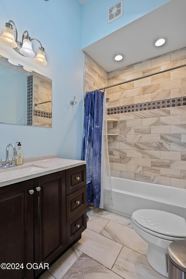 full bathroom with vanity, toilet, and shower / bath combo with shower curtain