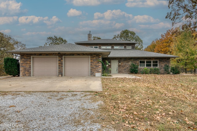 view of front of property with a garage