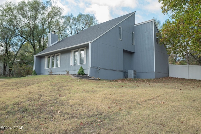 view of property exterior featuring a yard