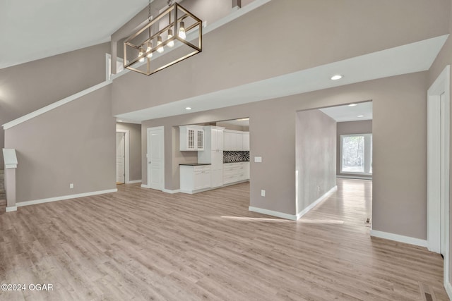 unfurnished living room with light hardwood / wood-style floors