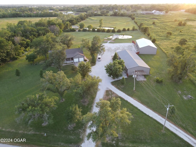 birds eye view of property featuring a rural view