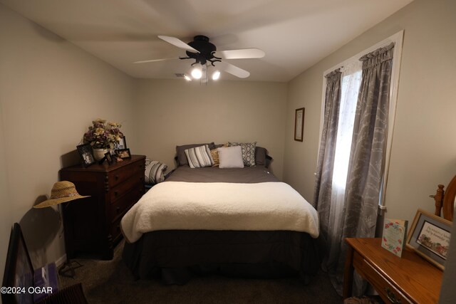 bedroom with carpet and ceiling fan