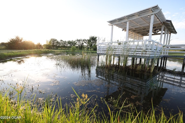 dock area featuring a water view