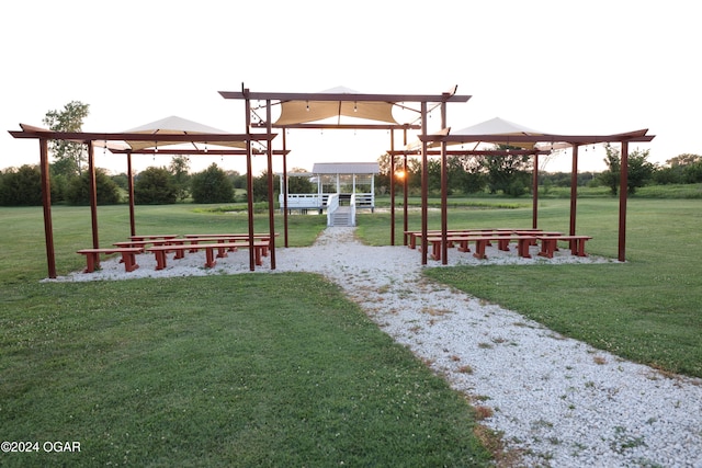 view of community featuring a gazebo and a lawn