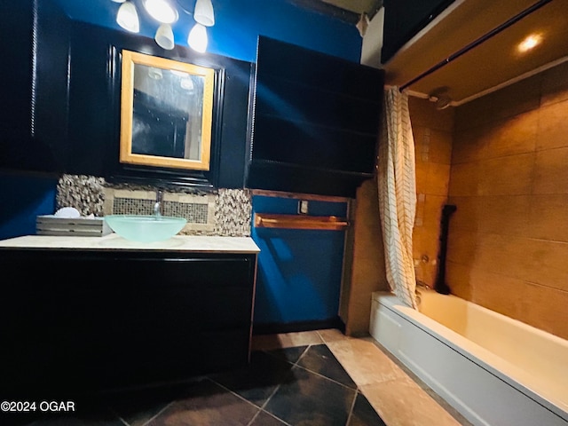 bathroom featuring shower / tub combo, backsplash, vanity, and tile patterned floors