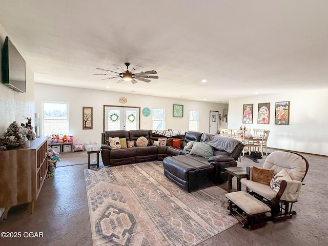 living room featuring recessed lighting, a ceiling fan, and french doors