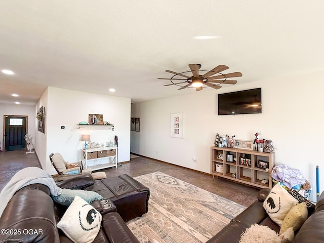 living room featuring ceiling fan, baseboards, and recessed lighting