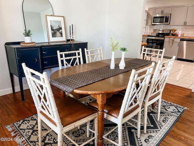 dining room featuring light hardwood / wood-style floors