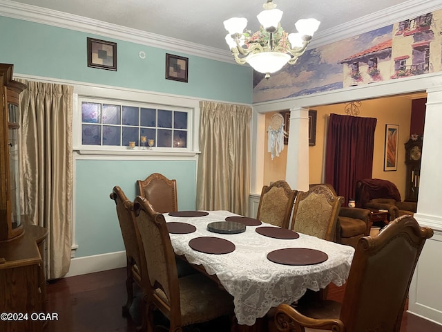 dining area with ornamental molding, dark wood-type flooring, ornate columns, and an inviting chandelier