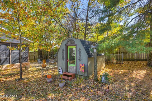 114 W F St, Joplin, MO 64801 - view of shed featuring fence