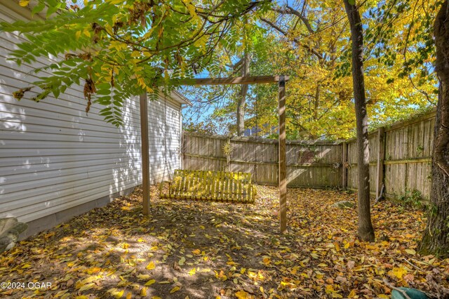 114 W F St, Joplin, MO 64801 - view of yard with fence