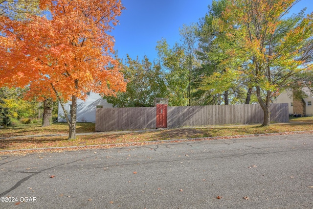 114 W F St, Joplin, MO 64801 - view of asphalt road featuring curbs