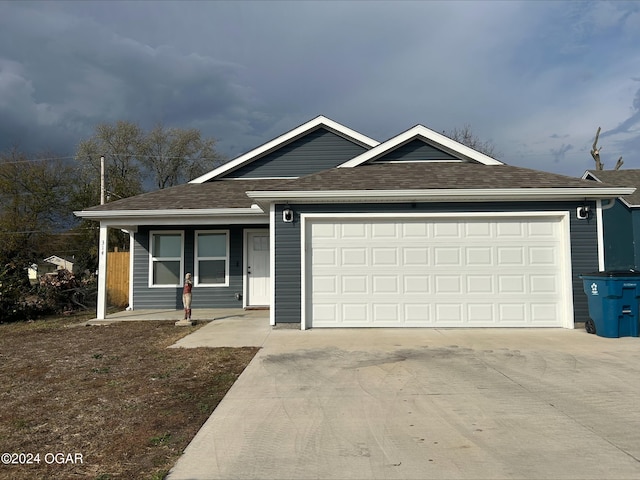 ranch-style house featuring a garage