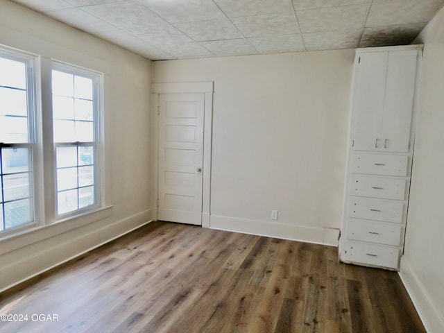 spare room featuring light wood-type flooring