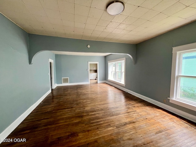 empty room with wood-type flooring