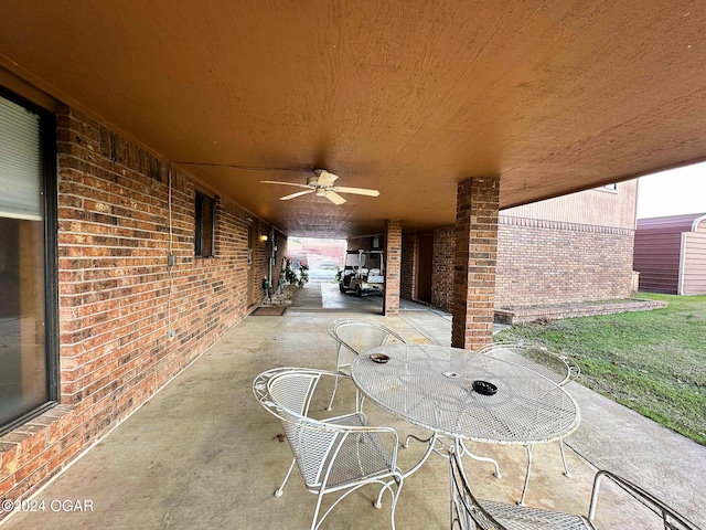 view of patio with ceiling fan