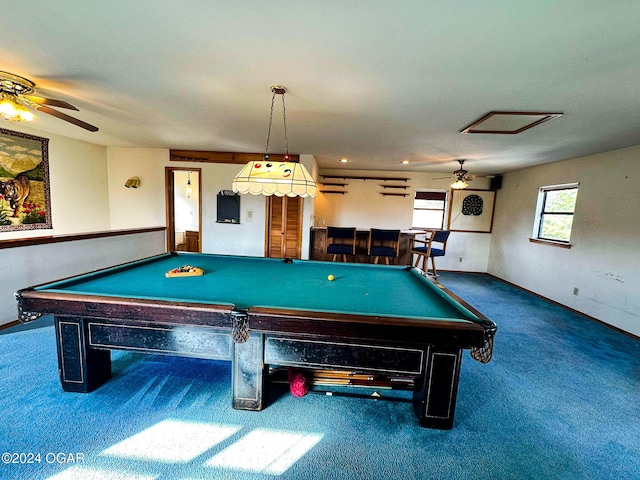 game room featuring ceiling fan, dark carpet, pool table, and indoor bar