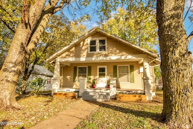 bungalow-style house featuring covered porch