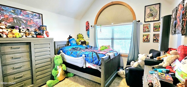 bedroom with carpet flooring and lofted ceiling