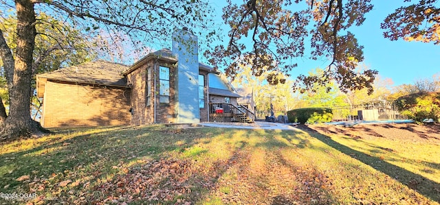 view of yard featuring a deck