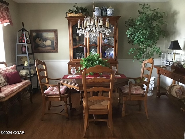 dining area featuring dark hardwood / wood-style flooring