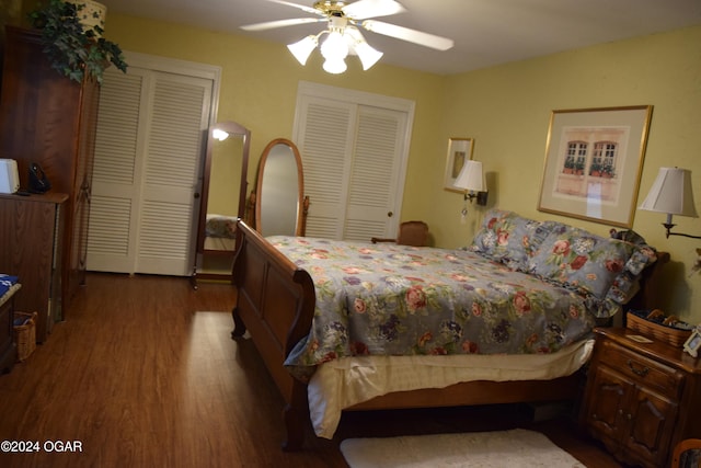 bedroom with ceiling fan and dark wood-type flooring