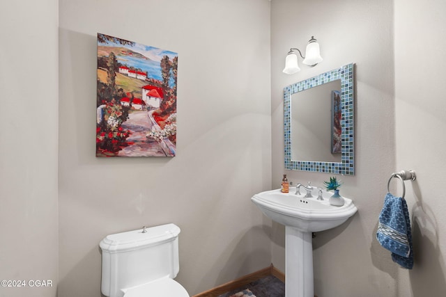 bathroom featuring toilet