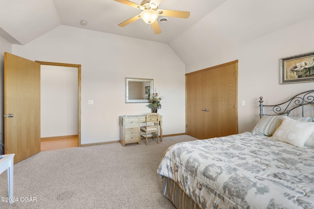 bedroom featuring light colored carpet, ceiling fan, and lofted ceiling