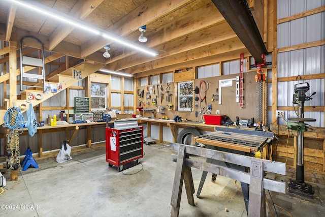 garage with a workshop area