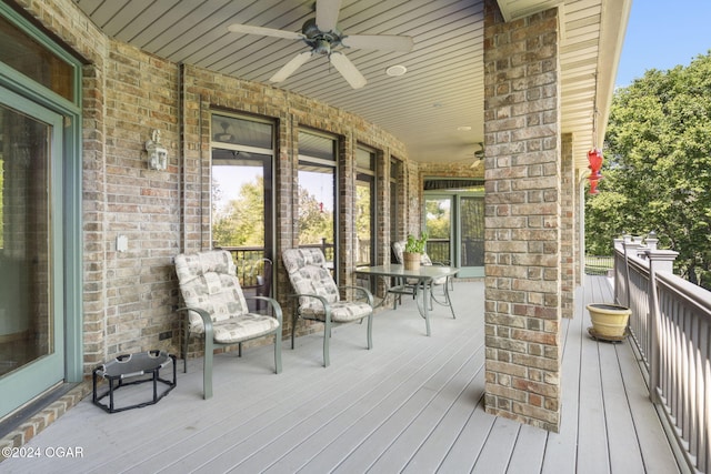 deck featuring ceiling fan and covered porch