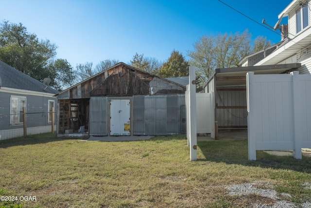 319-323 N Harlem Ave, Joplin, MO 64801 - view of yard featuring an outdoor structure