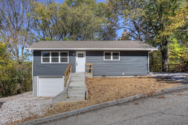 view of front of property featuring a garage