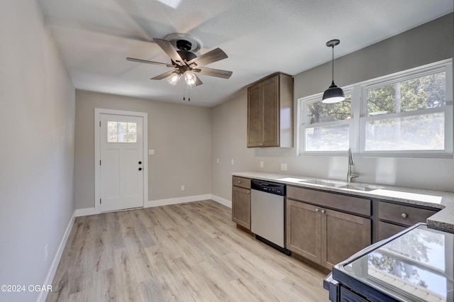 kitchen with ceiling fan, sink, decorative light fixtures, dishwasher, and light hardwood / wood-style floors