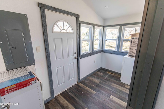 entryway with electric panel, dark hardwood / wood-style flooring, and vaulted ceiling