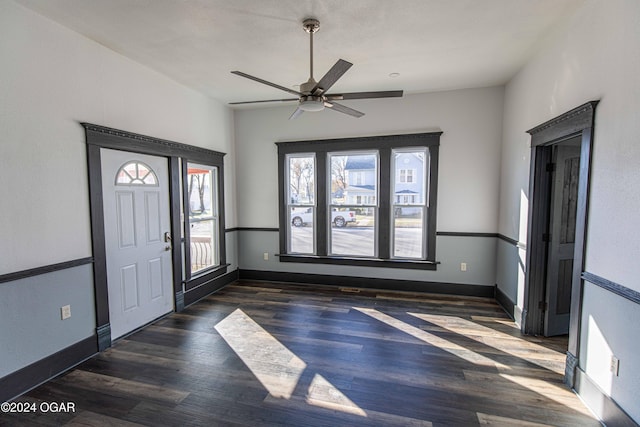 entrance foyer featuring ceiling fan and dark wood-type flooring