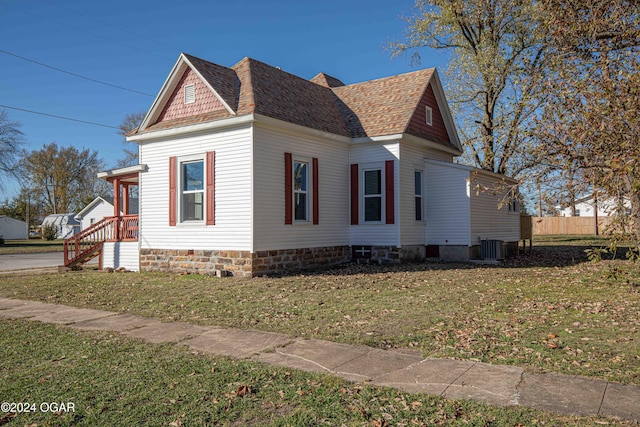 view of home's exterior featuring a yard