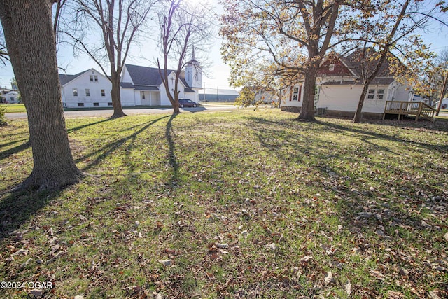 view of yard with a wooden deck