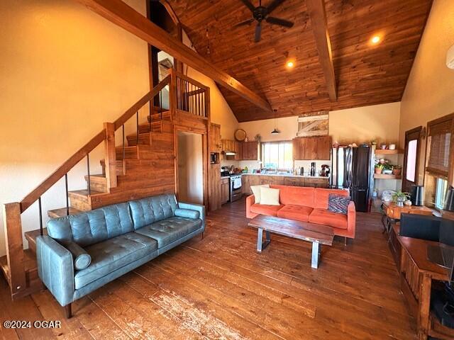 living room featuring ceiling fan, beam ceiling, high vaulted ceiling, wooden ceiling, and hardwood / wood-style floors