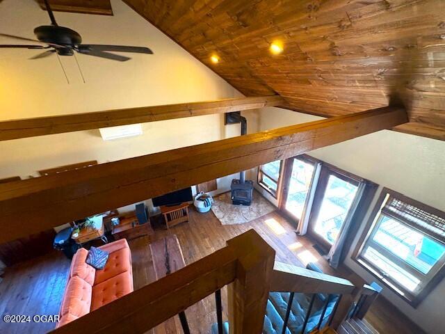 bonus room featuring ceiling fan, hardwood / wood-style floors, wood ceiling, and lofted ceiling