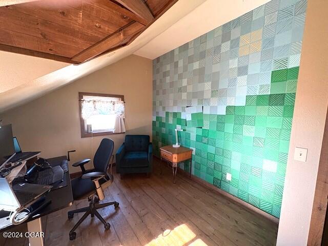 office space featuring lofted ceiling, wood-type flooring, and wood ceiling