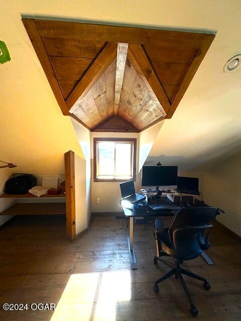 office featuring vaulted ceiling, wood-type flooring, and wooden ceiling