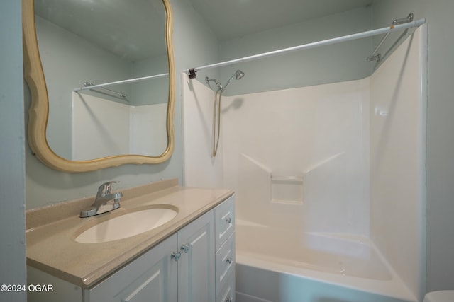 bathroom with vanity and shower / bathtub combination